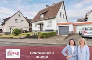 Einfamilienhaus kaufen in 34225 Baunatal, Einfamilienhaus in gefragter Lage - mit zwei Garagen und großem Garten