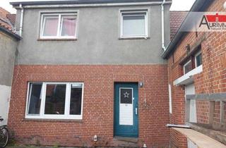 Anlageobjekt in 26736 Krummhörn, Attraktives Mehrfamilienhaus, mit 3 Wohneinheiten, Gewerbeeinheit u. Ausbaureserve