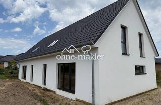 Doppelhaushälfte kaufen in 24326 Ascheberg, Zu Hause in ruhiger Lage / Haus mit individueller Ausbaumöglichkeit