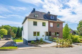 Haus kaufen in 41849 Wassenberg, Erstbezug nach Sanierung: DHH in Waldrandlage