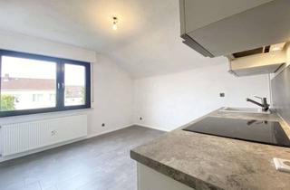 Wohnung kaufen in 63073 Bieber, Helle Dachgeschosswohnung mit Einbauküche - Vermietet