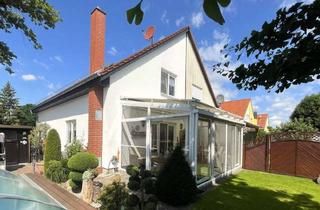 Doppelhaushälfte kaufen in Wolfsgartenstraße 6d, 06847 Kochstedt, Ihr Rückzugsort zum Wohlfühlen: Gepflegte Doppelhaushälfte mit Garage, Gartenidylle & Pool