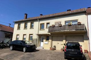 Haus kaufen in 66839 Schmelz, Renditeobjekt in ruhiger Wohnlage von Schmelz