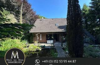 Einfamilienhaus kaufen in 26835 Holtland, Charmantes Einfamilienhaus mit großem Garten, Teich, Terrasse und Kamin in ruhiger Lage von Hesel!