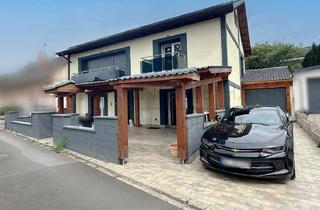 Haus mieten in 55595 Roxheim, Stilvolles Einfamilienhaus mit Garten, Garage und großer Terrasse.