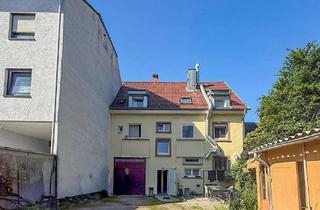 Gewerbeimmobilie kaufen in 76275 Ettlingen, Attraktives Mehrfamilienhaus mit Ladengeschäft in zentraler Lage in Ettlingen