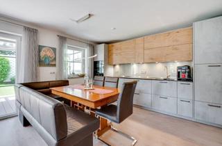 Wohnung kaufen in 82216 Maisach, AIGNER - Stilvolle 3,5 Zimmer Erdgeschosswohnung mit Terrasse und Garten in Toplage