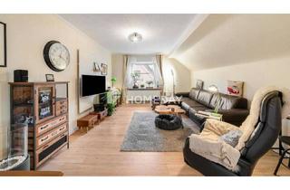 Wohnung kaufen in 44653 Herne, Herne - Exklusives Wohnen im Dachgeschoss - Charmante 3-Zimmer-Wohnung mit Garten und Garage