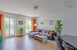 Wohnung kaufen in 85757 Karlsfeld, Sonnenuntergang inklusive - Traumhafte 2-Zimmer-Wohnung mit 35 m² Dachterrasse