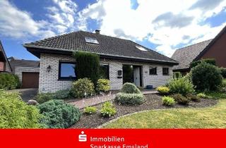 Haus kaufen in 49740 Haselünne, Weißer Winkelbungalow mit idyllischem Garten