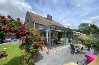 Doppelhaushälfte kaufen in 32120 Hiddenhausen, Doppelhaushälfte mit Wintergarten in Oetinghausens Zentrum zu sofort