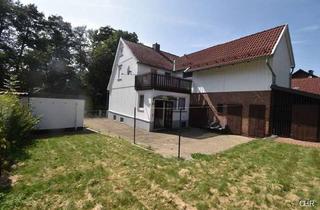 Einfamilienhaus kaufen in 37445 Walkenried, Freistehendes Einfamilienhaus mit kleinem Nebengelass, Garage und ebenerdigen Grundstück