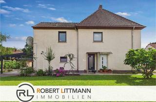 Haus kaufen in 28755 Bremen, Bremen Nord - Vielseitiges Zweifamilienhaus in ruhiger Lage