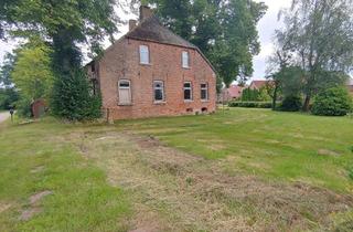 Immobilie kaufen in Süderstraße 37, 26835 Holtland, Gulfhaus in malerischer Stille mit altem Baumbestand in Holtland