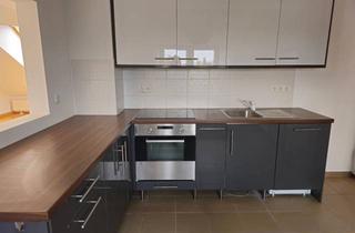 Wohnung kaufen in 85560 Ebersberg, Schöne & helle Dachgeschosswohnung in ruhiger Lage mit Alpenblick