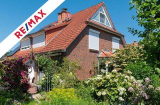 Doppelhaushälfte kaufen in 21244 Buchholz, Buchholz in der Nordheide - Lichtdurchflutete Doppelhaushälfte mit Gartenidylle