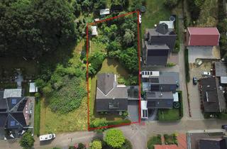 Haus kaufen in 49843 Uelsen, Uelsen - Freistehendes Wohnhaus mit großzügigem Garten und Ausbaureserve.
