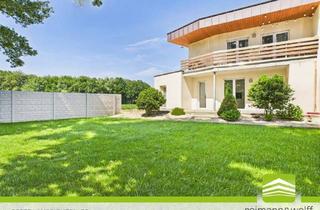Haus kaufen in 52525 Heinsberg, Heinsberg - REIMANN&WOLFF Heinsberg-Oberbruch: Zukunftssicher und neuwertig: Ihr Zweifamilienhaus.
