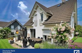 Einfamilienhaus kaufen in 35641 Schöffengrund, Schöffengrund - Modernes Familienhaus in ruhiger Lage mit großzügigem Wohnkomfort