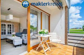Wohnung kaufen in 26409 Wittmund, Nordseeheilbad Carolinensiel: schicke Eigentumswohnung mit Balkon in zentraler Lage