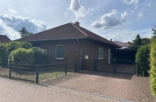 Haus kaufen in 31595 Steyerberg, Steyerberg - Charmanter Winkelbungalow mit Carport - Platz für Ihre Träume!