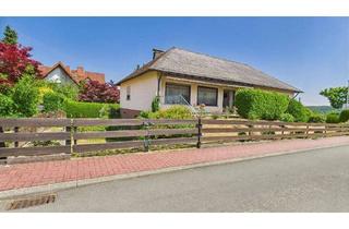 Haus kaufen in 65510 Hünstetten, Hünstetten - Bungalow mit Walmdach, Keller & Garten im Hünstetten - ca.?103?m²