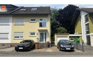 Wohnung kaufen in 63486 Bruchköbel, Erdgeschosswohnung mit großem Garten und Garage als Kapitalanlage