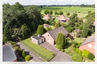 Einfamilienhaus kaufen in 26759 Hinte, Familienfreundliches Einfamilienhaus mit Garage und viel Platz im Grünen