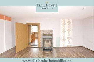 Reihenhaus kaufen in 39397 Gröningen, Gemütliches Reihenhaus mit kleiner Ladeneinheit oder Büro.