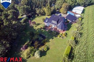 Einfamilienhaus kaufen in 24802 Bokel, Attraktives Anwesen mit Traumhaus und Gewerbehalle auf 5.000 qm Grundstück zu verkaufen!