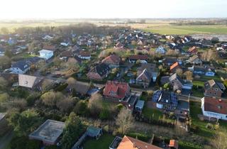 Mehrfamilienhaus kaufen in 27639 Dorum, Dorum - Großzügiges Mehrfamilienhaus in Dorum - Gepflegt, vielseitig und mit Doppelgarage
