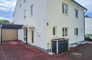 Doppelhaushälfte kaufen in 65439 Flörsheim, Gepflegte Doppelhaushälfte mit Gartenidylle, Dachstudio und Carport – ideal für Familien