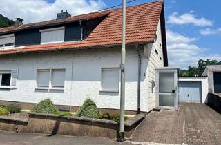 Einfamilienhaus kaufen in 66663 Merzig, Gepflegtes Einfamilienhaus mit Garten und Garage in zentraler Lage von Merzig