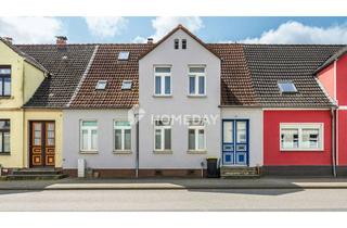 Anlageobjekt in 18311 Ribnitz-Damgarten, Vermietetes Zweifamilienhaus mit viel Stauraum im Keller