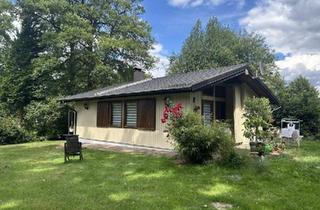 Haus kaufen in 21255 Tostedt, Tostedt - Provisionsfrei! Holzhaus am See, ganzj. bewohnb. eig. Seeanteil