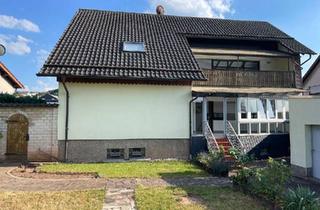 Wohnung kaufen in 66265 Heusweiler, Heusweiler - Traumhafte Erdgeschosswohnung in 3 FH mit eigenem Garten