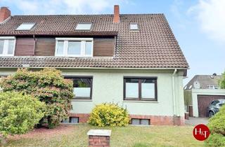 Haus kaufen in 28832 Achim, Achim - Haushälfte mit zwei vermieteten Wohneinheiten und großem Grundstück!