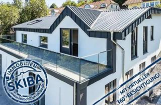 Wohnung kaufen in 54550 Daun, Erstbezug: Moderne Neubau-Erdgeschoss-Eigentumswohnung mit 2 Garagen in Daun-Pützborn