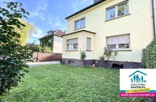Wohnung kaufen in 65795 Hattersheim, Charmante Maisonette-Wohnung mit Balkon und Gartenanteil - nur 2 Parteien