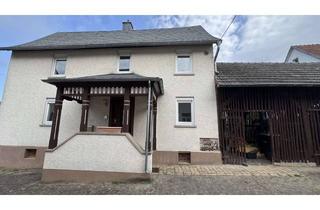 Bauernhaus kaufen in 35606 Solms, Kleiner Bauernhof mit Stallungen, Innenhof, Garten und modernisiertem Wohnhaus