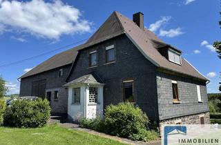Bauernhaus kaufen in 56472 Hof, Ehemaliges Bauernhaus in Alleinlage mit großer Garage und großem Grundstück.