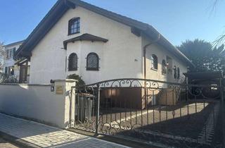 Einfamilienhaus kaufen in 61184 Karben, Familienfreundliches Einfamilienhaus mit schönem Garten in Karben