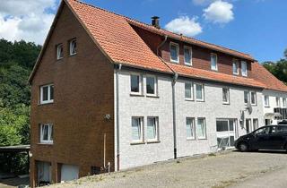 Anlageobjekt in 32699 Extertal, Vollvermietetes Mehrfamilienhaus mit Garagen und Carport