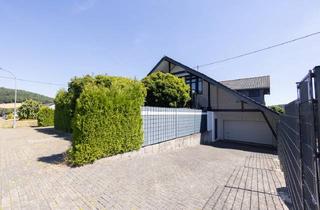 Wohnung kaufen in 56729 Herresbach, TOP moderne Dachgeschosswohnung in Herresbach - Exclusiv wohnen mit Glas und Raum!