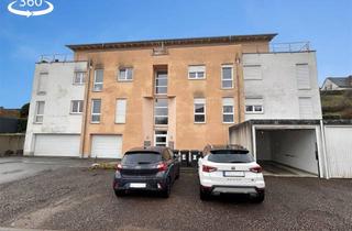 Wohnung kaufen in 66636 Tholey, Vermietete Dreizimmerwohnung im 2. Obergeschoss mit Terrasse und Stellplatz