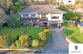 Einfamilienhaus kaufen in 55606 Hochstetten-Dhaun, Gemütliches Familienparadies mit vielseitigen Nutzungsmöglichkeiten und separaten Eingängen.