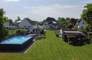 Einfamilienhaus kaufen in 32584 Löhne, Gartenoase mit Pool: Ein-/Zweifamilienhaus mit Wintergarten nahe Schloß Ulenburg