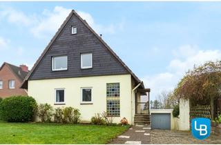 Einfamilienhaus kaufen in 24220 Flintbek, Familienfreundliches Haus mit Garten und Renovierungsbedarf