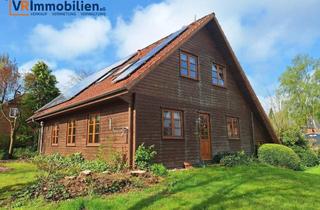 Einfamilienhaus kaufen in 24405 Mohrkirch, Zauberhaftes Holzbohlenhaus mit Einliegerwohnung in Mohrkirch