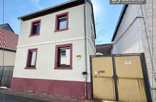 Einfamilienhaus kaufen in 55294 Bodenheim, Charmantes, kleines Einfamilienhaus mit gemütlichem Hof und Nebenflächen in guter Ortskernlage
